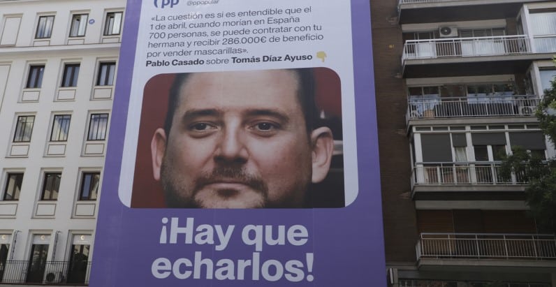 lona de Podemos en calle Goya Madrid contra el hermano de Ayuso Junta Electoral